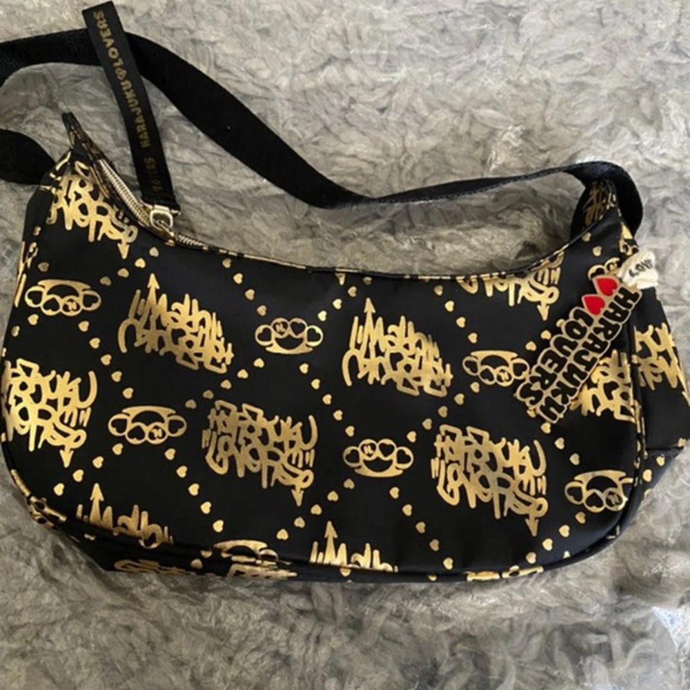 Harajuku Lovers brass knuckles shoulder bag